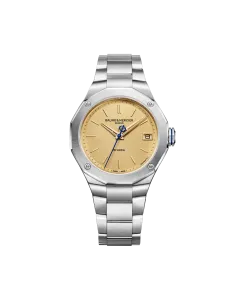 Baume & Mercier RIviera  med Baumatic-verk til herre p&aring; 39 mm. Gul skive, kasse og lenke i st&aring;l. 100 meter vanntett.