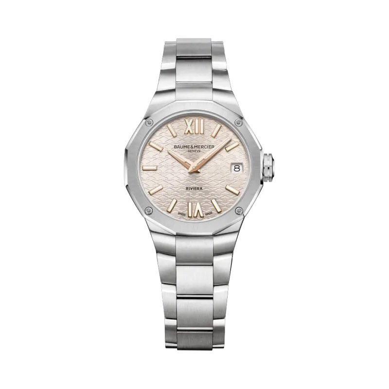 Baume & Mercier Rivera dameklokke med quartzverk på 33 mm. Kasse og lenke i stål, og en champagnefarget skive. 50 meter vanntett.