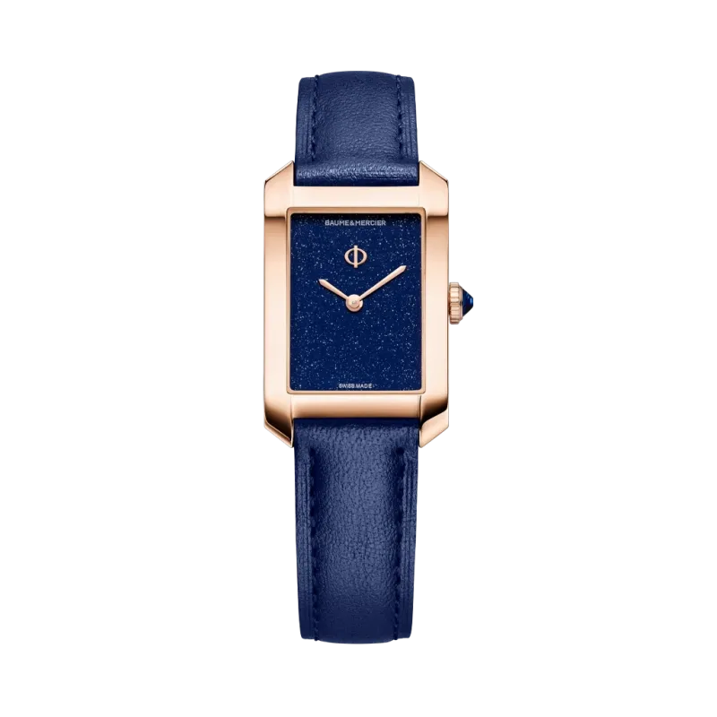Baume & Mercier Hampton 10674 er en rektangulær dameklokke - en gullklokke med blå rem. 50 meter vanntett.