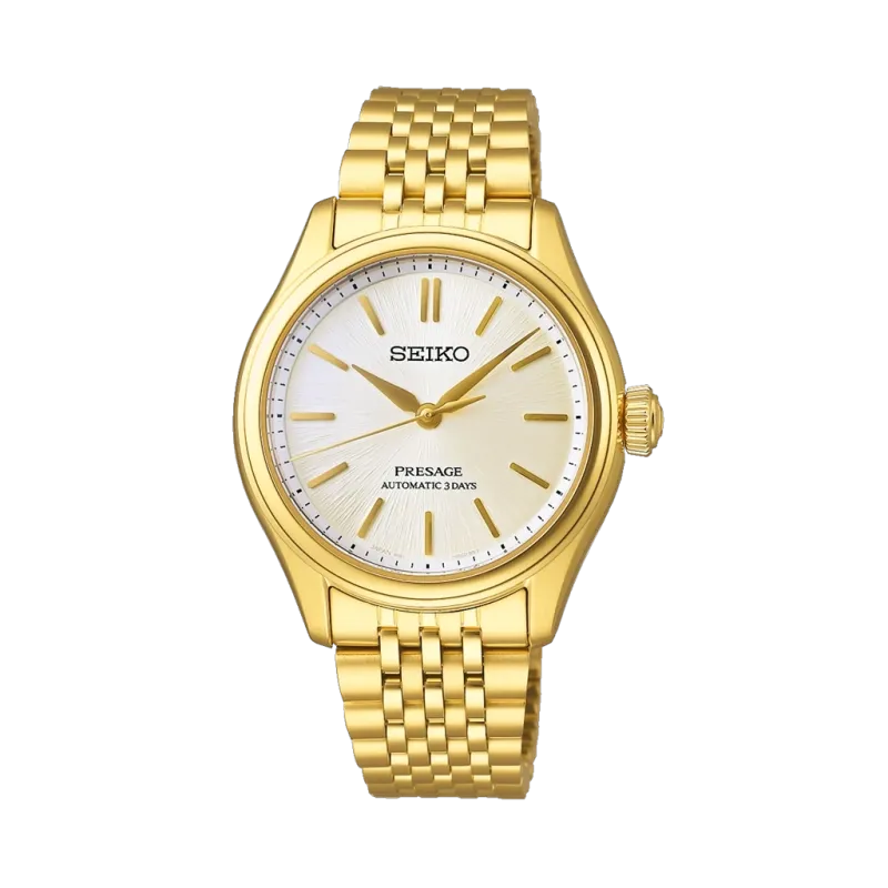 Seiko Presage Classic SPB524J1 er en unisexklokke på 36 mm i gullfarget stål med lys skive. 